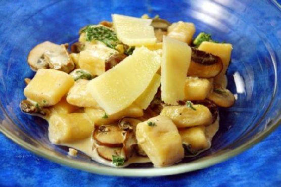 Potato Gnocchi With Kale and Mushrooms In A Goat Cheese Sauce